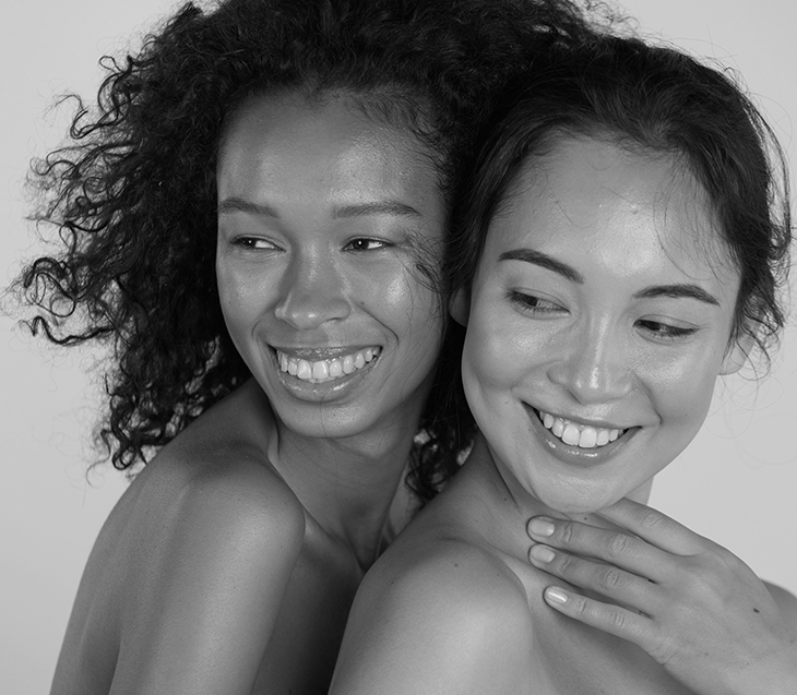 Two Women Modeling In Awe Skincare